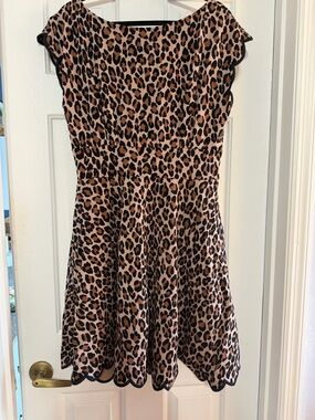 kate spade Leopard Print Scallop Hem Dress with pockets and gold zipper details.